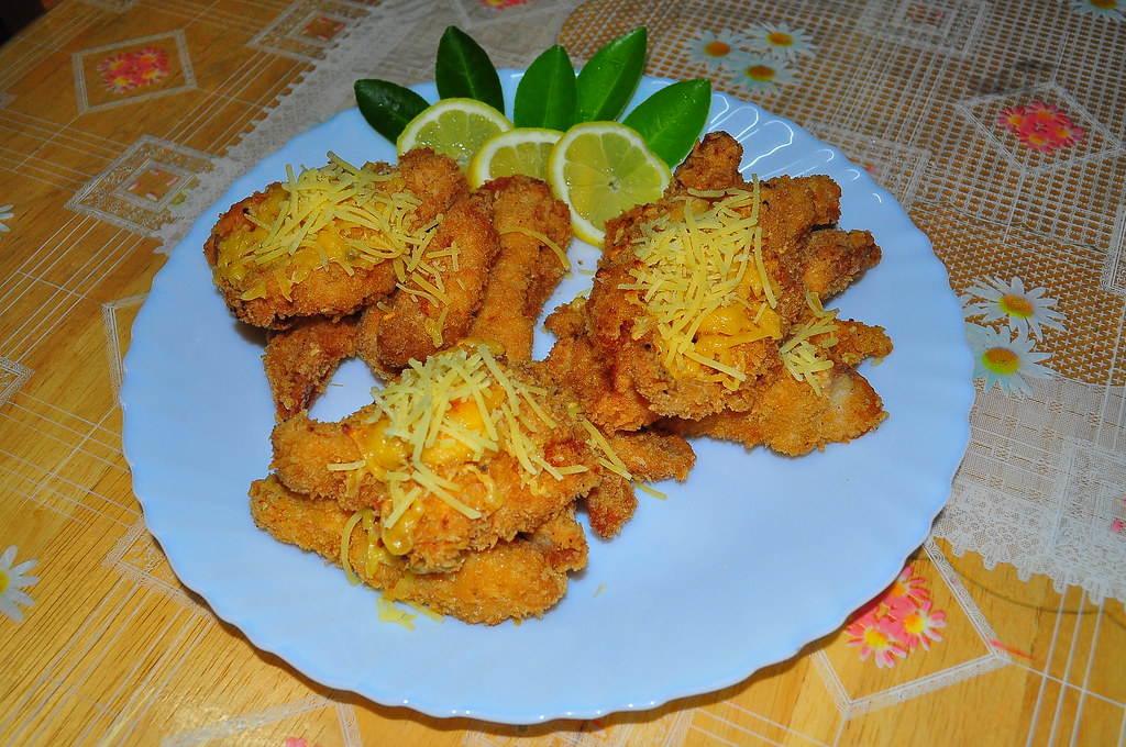 Pechugas de pollo empanizadas con limón y queso rallado